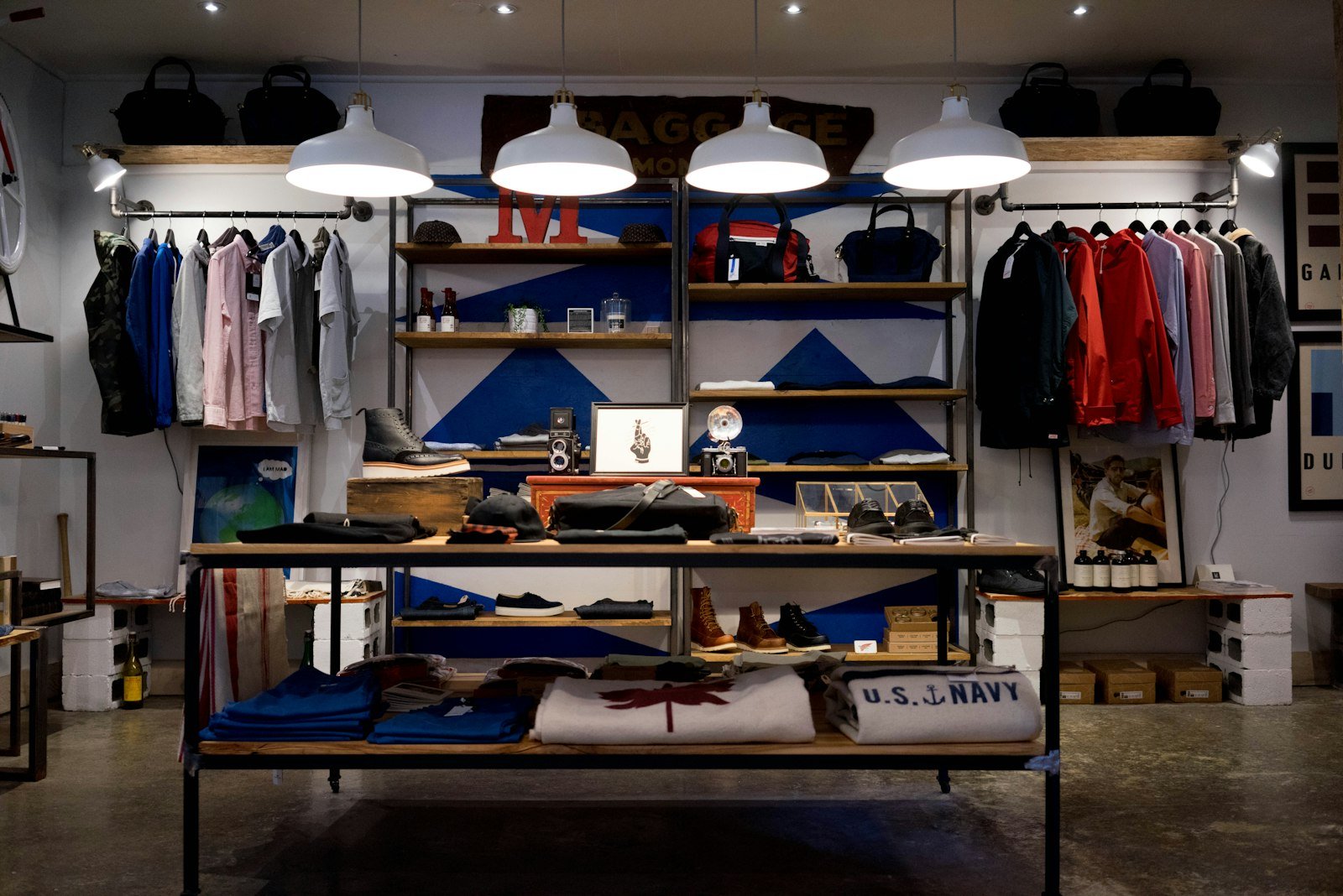 Interior of a well-presented local retail shop with clothing displays and warm lighting, representing a UK SME ready for Google Business Profile SEO.
