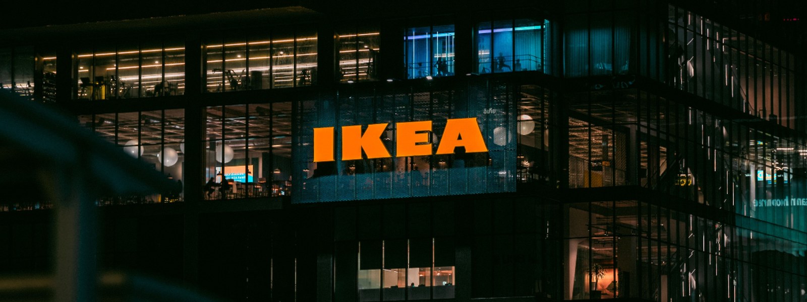IKEA storefront signage lit up at night