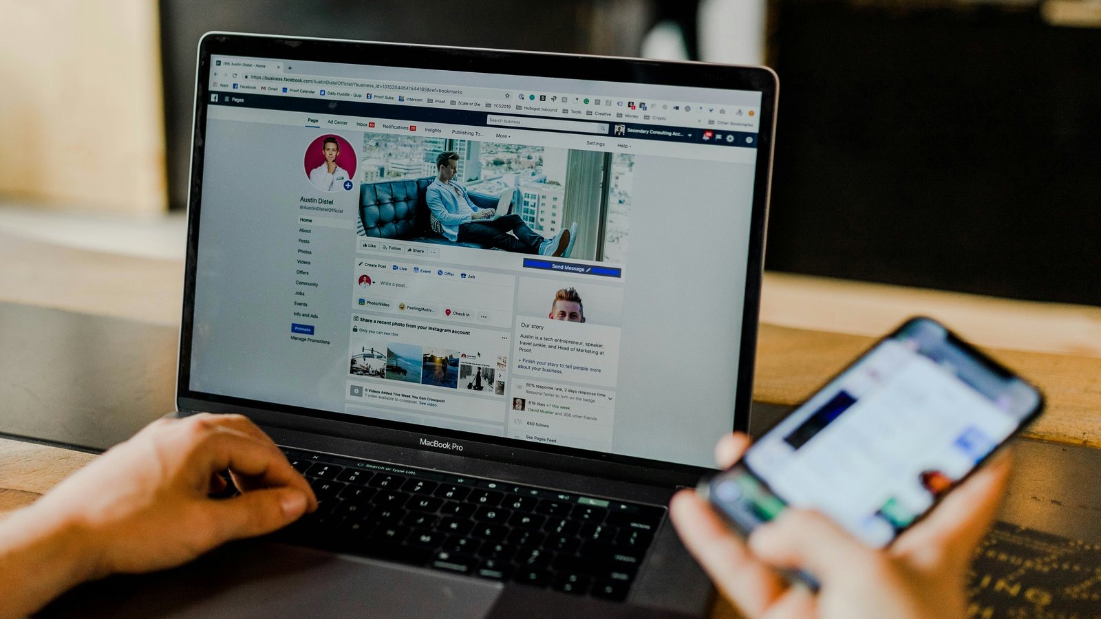 A laptop open on a Facebook business page next to a smartphone, showing organic social content