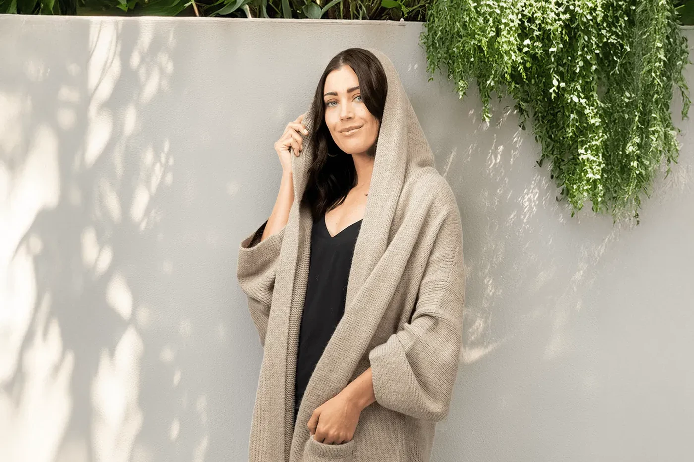 A Simply Natural alpaca hooded coat, photographed on location